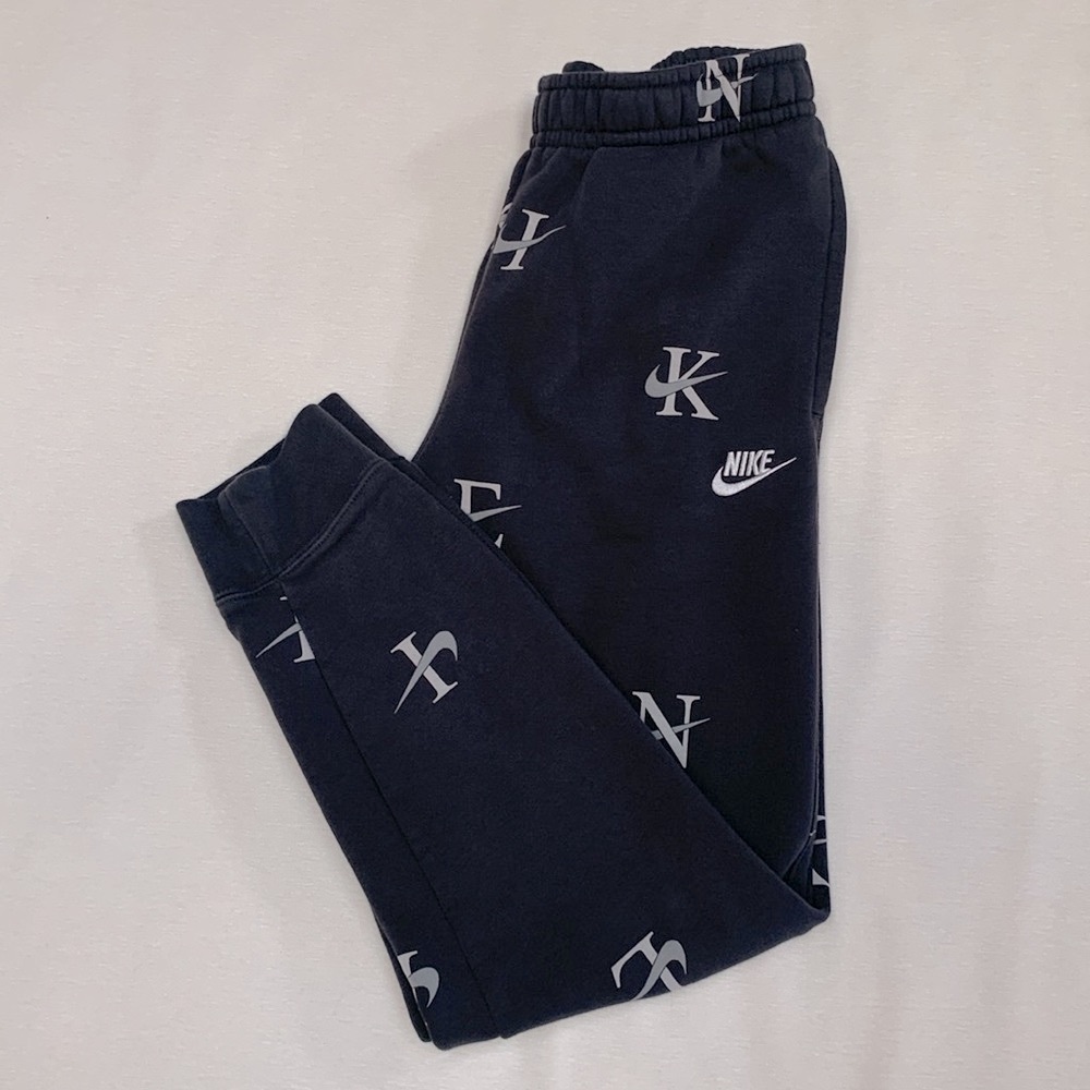 Nike sweatpants/ joggers with logo all over - in excellent condition